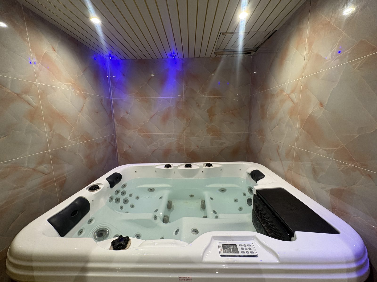 Private Jacuzzi with blue accent lighting